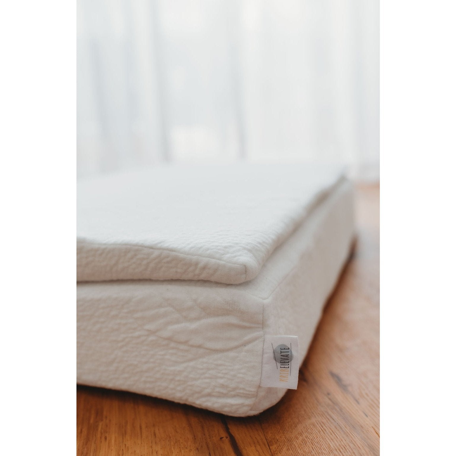 Non-toxic, easy to clean crib wedge for baby's nursery