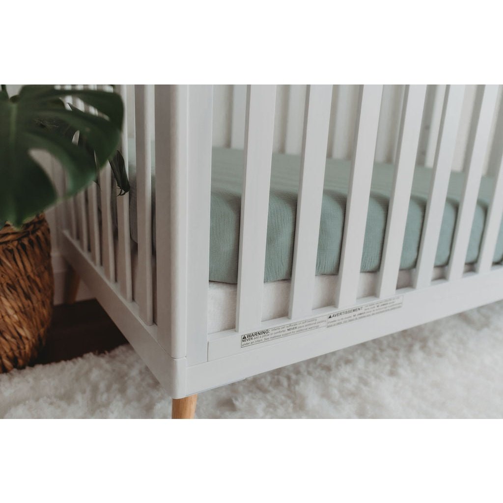 Ergonomic crib wedge for optimal baby posture